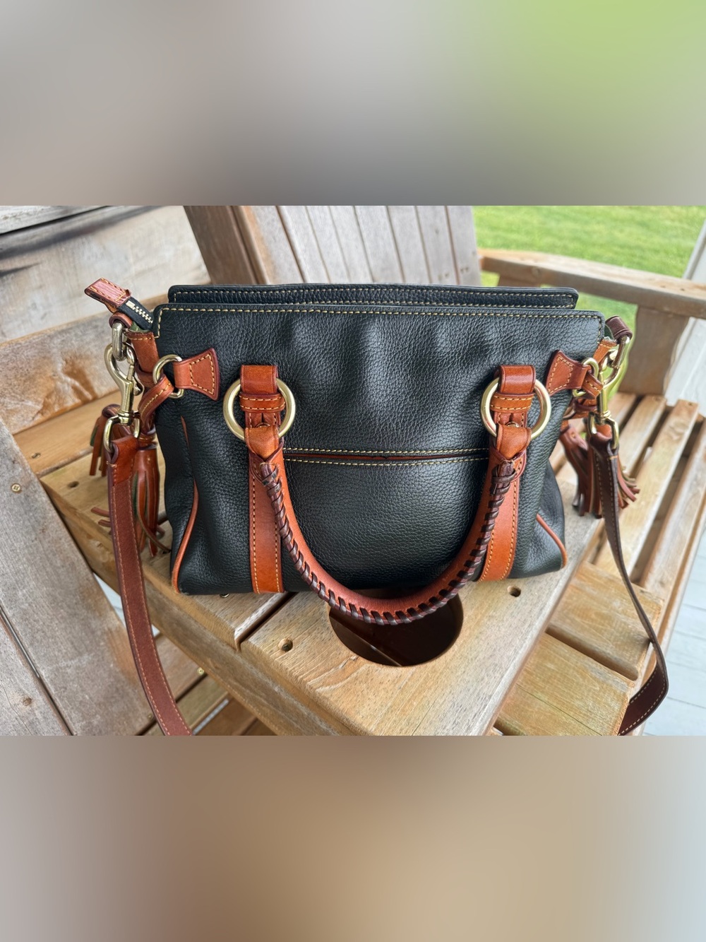 Dooney & Bourke Black Leather Satchel with Brown Trim and Brass Rings